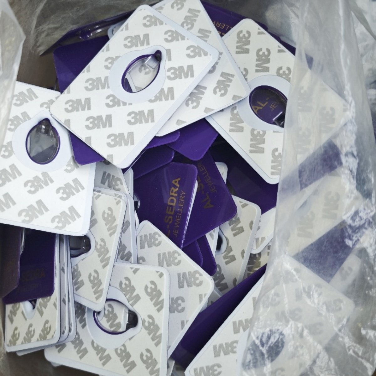 Bulk production view of commemorative coin blister packaging cards