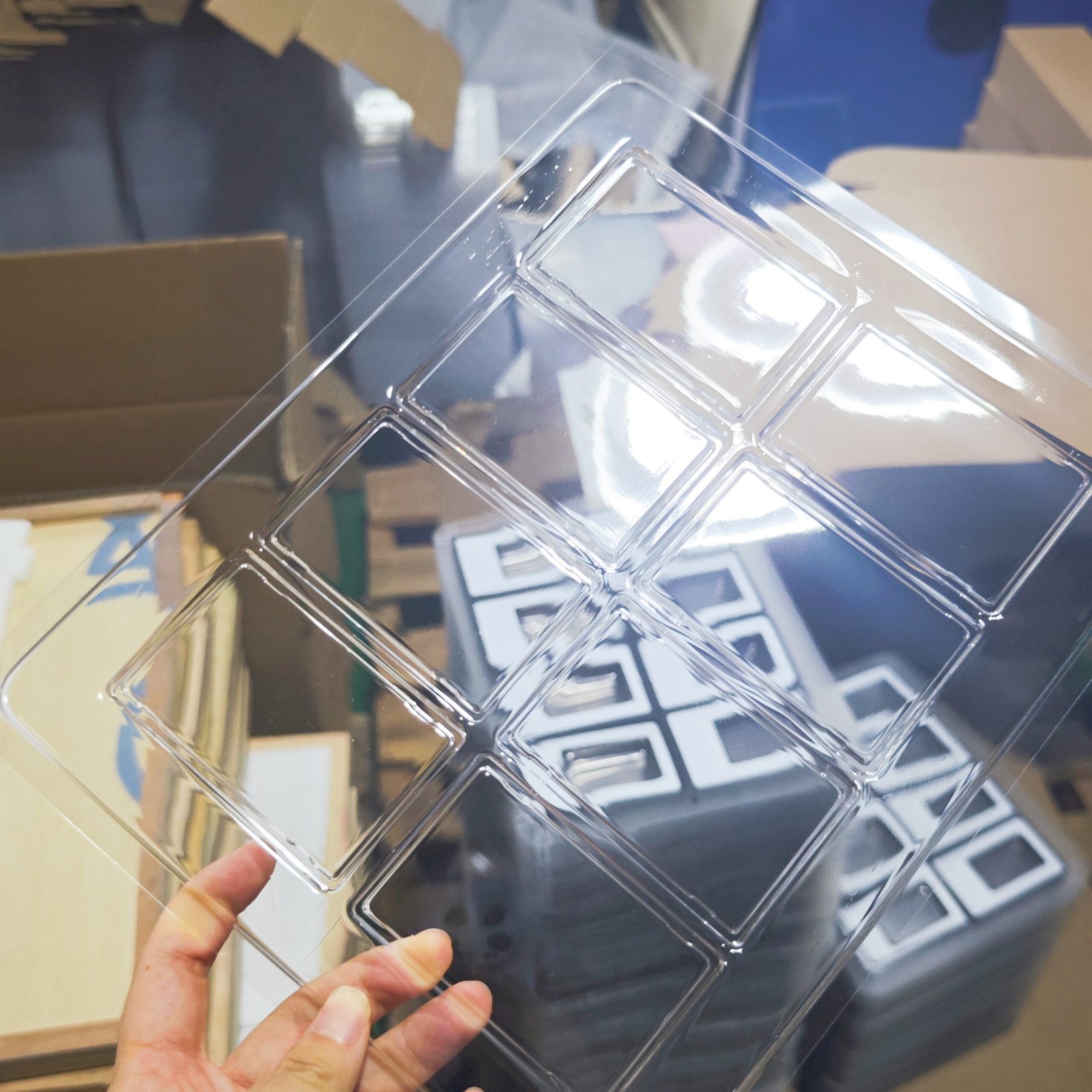 Production process for custom blister card packaging with formed cavities for precious metal products