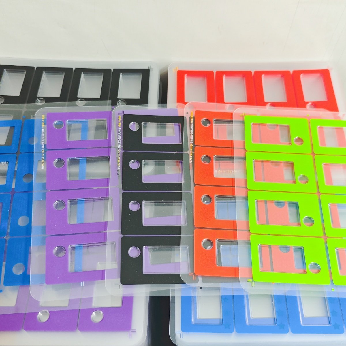 Multiple colorful pre-printed backing sheets for custom coin blister assay cards